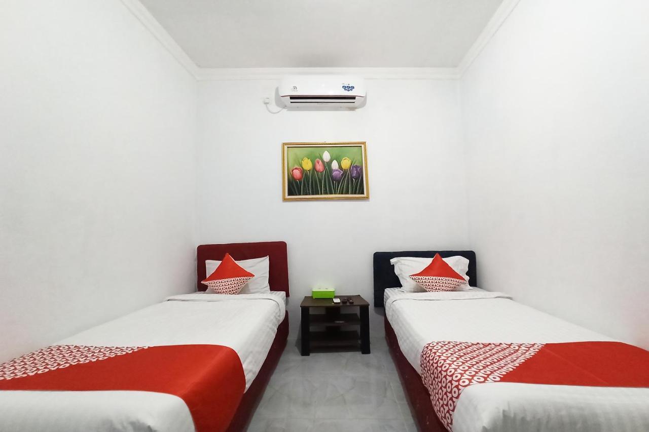 Oyo 2611 Hotel Krui Syariah ภายนอก รูปภาพ